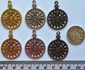 gold, silver and bronze compass.jpg